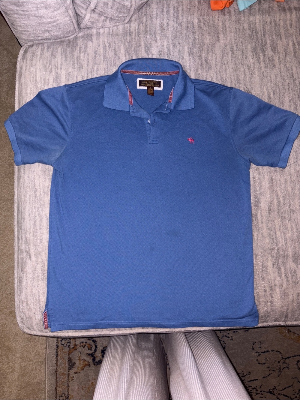 Men's Blue Polo Shirt with Pink Logo